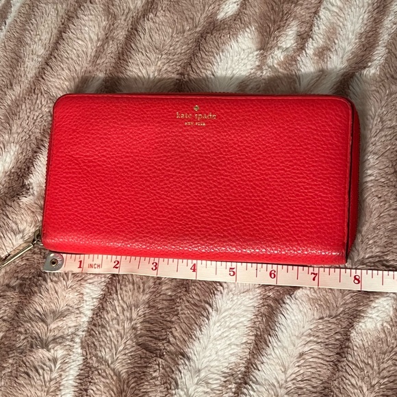 Adorable Kate Spade pebble leather coral zip wallet. Used, but good condition. - Picture 15 of 16